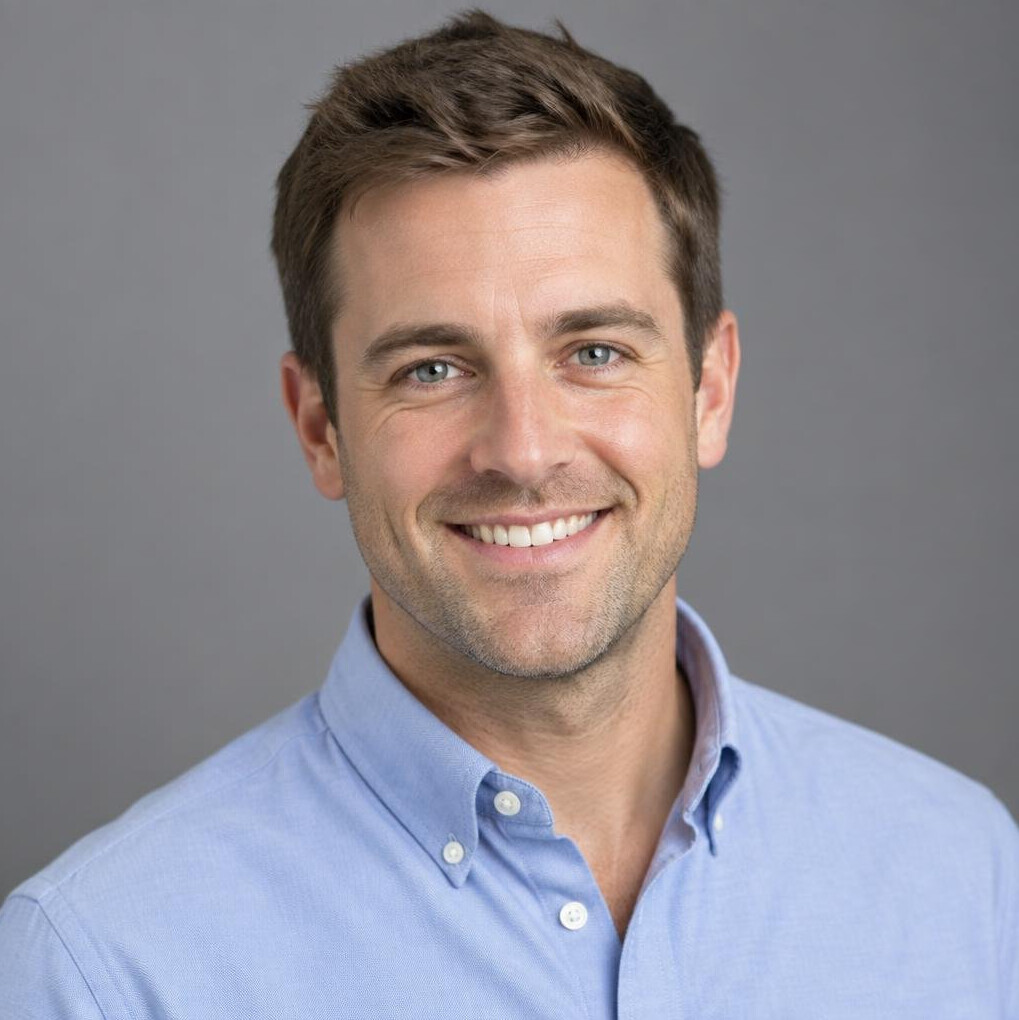 Portrait of a British man with short hair smiling